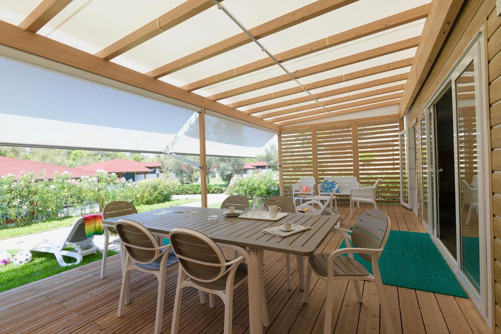 Isamar Holiday Village Ca Lino Room photo A pergola with a retractable awning